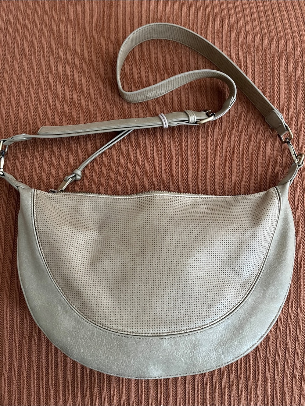 Anthropologie Perforated Crescent Shoulder Bag in Light Gray